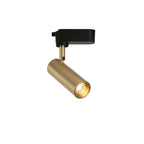Single gold Clérachic spotlight on a slim stem, with a black track adaptor, seen from the side on white.