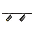 Two black cylindrical Clérachic spotlights on a straight black track, shown on a plain white background.