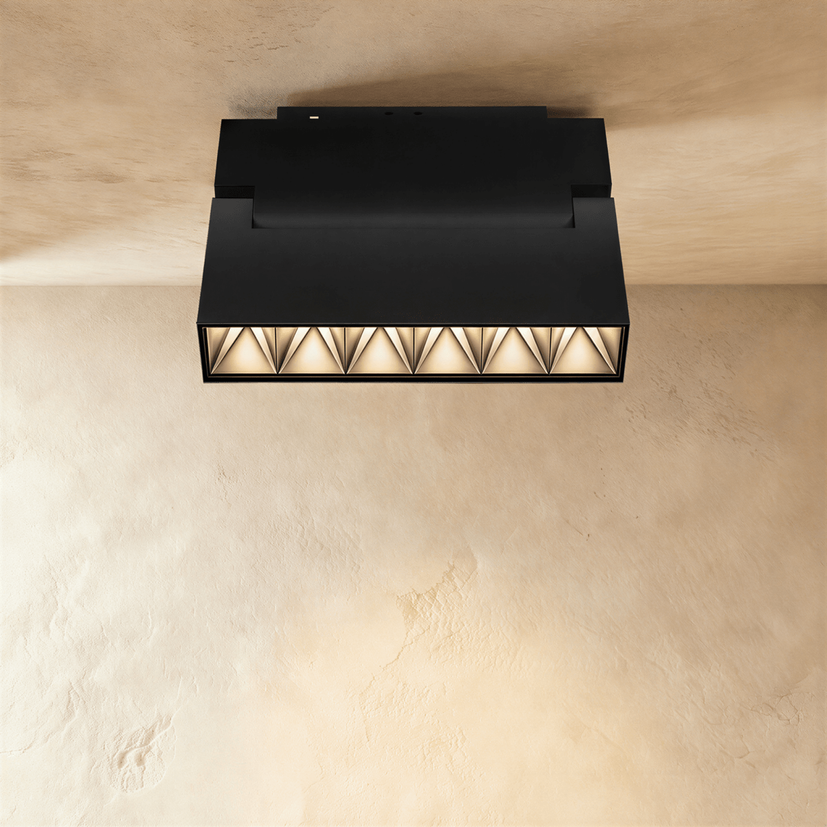 Clérachic black rectangular grille spotlight with a honeycomb lens, recessed-look fixture mounted on a ceiling rail.