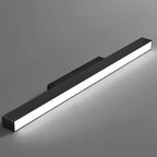 Clérachic slim black linear floodlight bar shown close against grey, its frosted diffuser lit edge to edge.