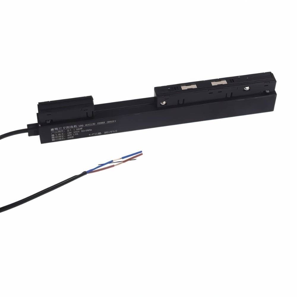 Clérachic track lighting feed connector and power cable, shown with its wiring and manufacturer rating label.