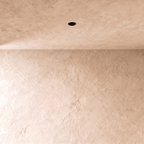 Clérachic black trimless downlight recessed flush into a plaster ceiling, with only a small dark aperture showing.