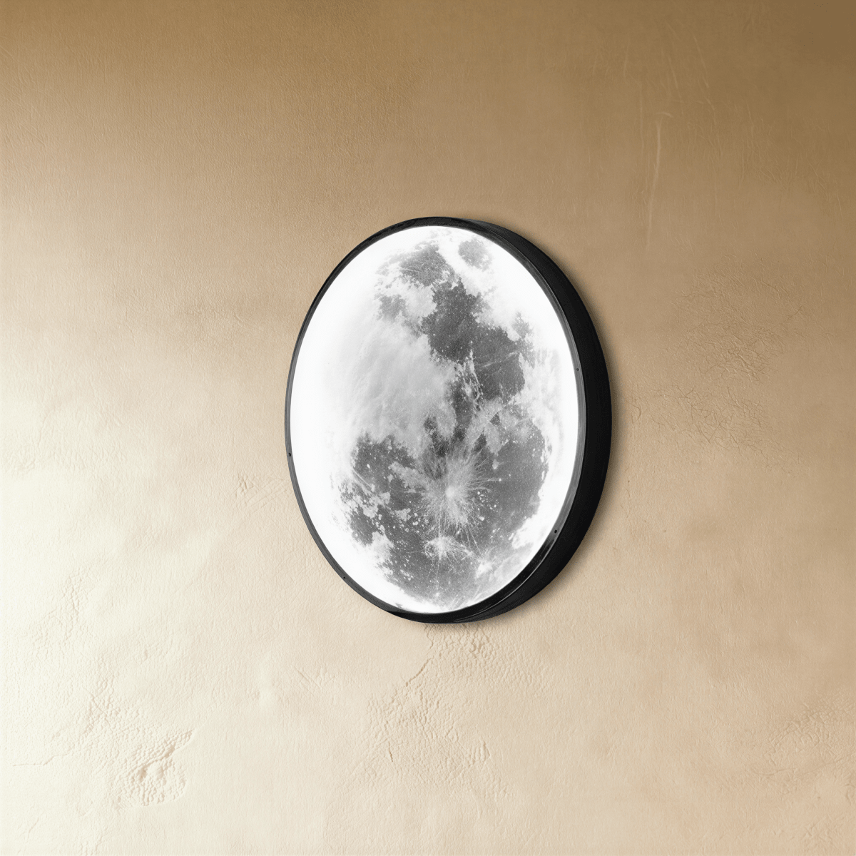 Clérachic moon wall lamp shown unlit from an angle, its grey lunar surface art visible beneath the curved glass.