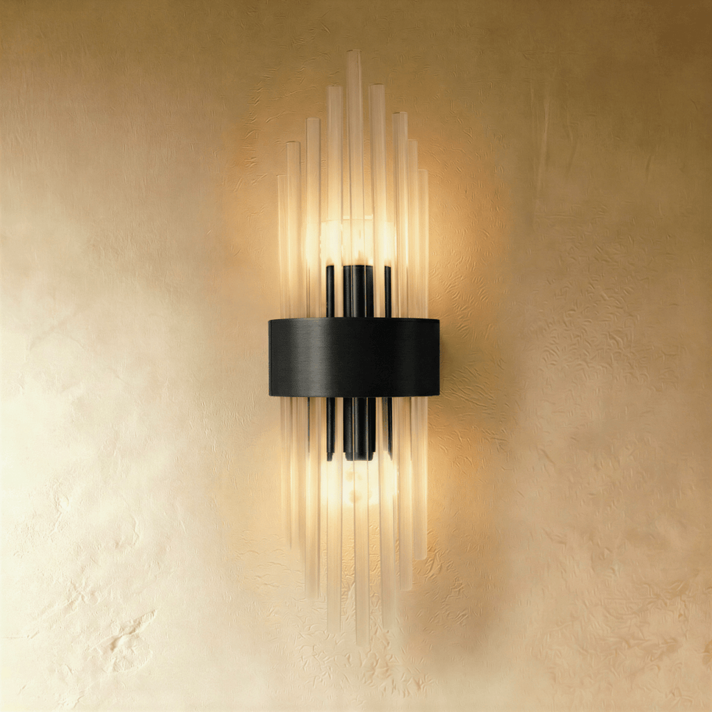 Clérachic black metal wall sconce with fluted glass rods radiating from a rectangular backplate against plaster.