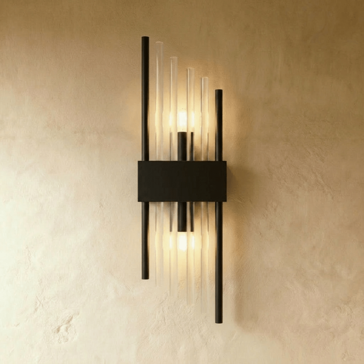 Clérachic black metal wall sconce with long fluted glass rods and twin metal posts on a slim backplate.