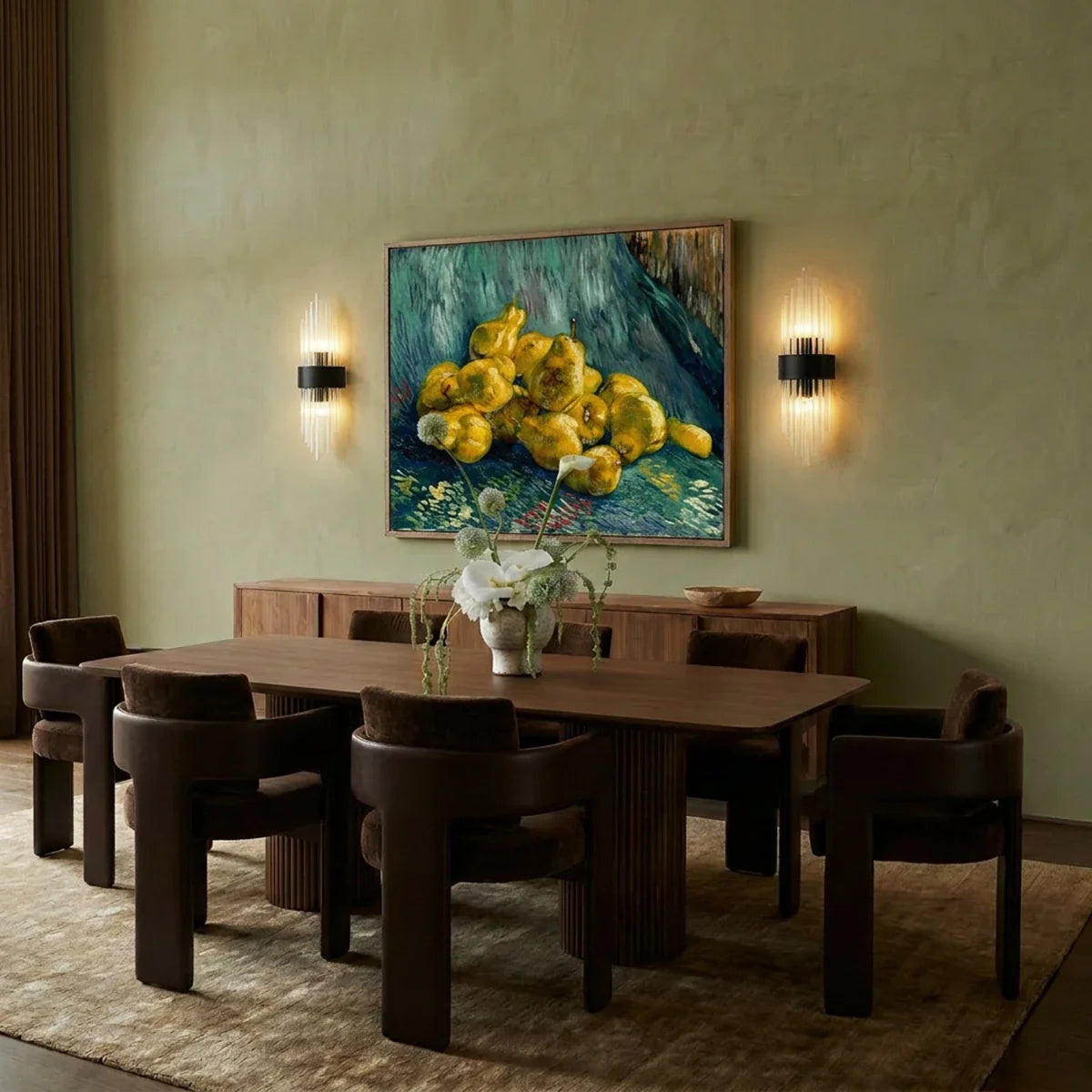 Clérachic black metal wall sconces flanking a framed painting above a walnut sideboard in a dining room.