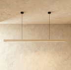 This angle shows the Clérachic pine pendant bar's warm wood grain, hung from two round black mounts.
