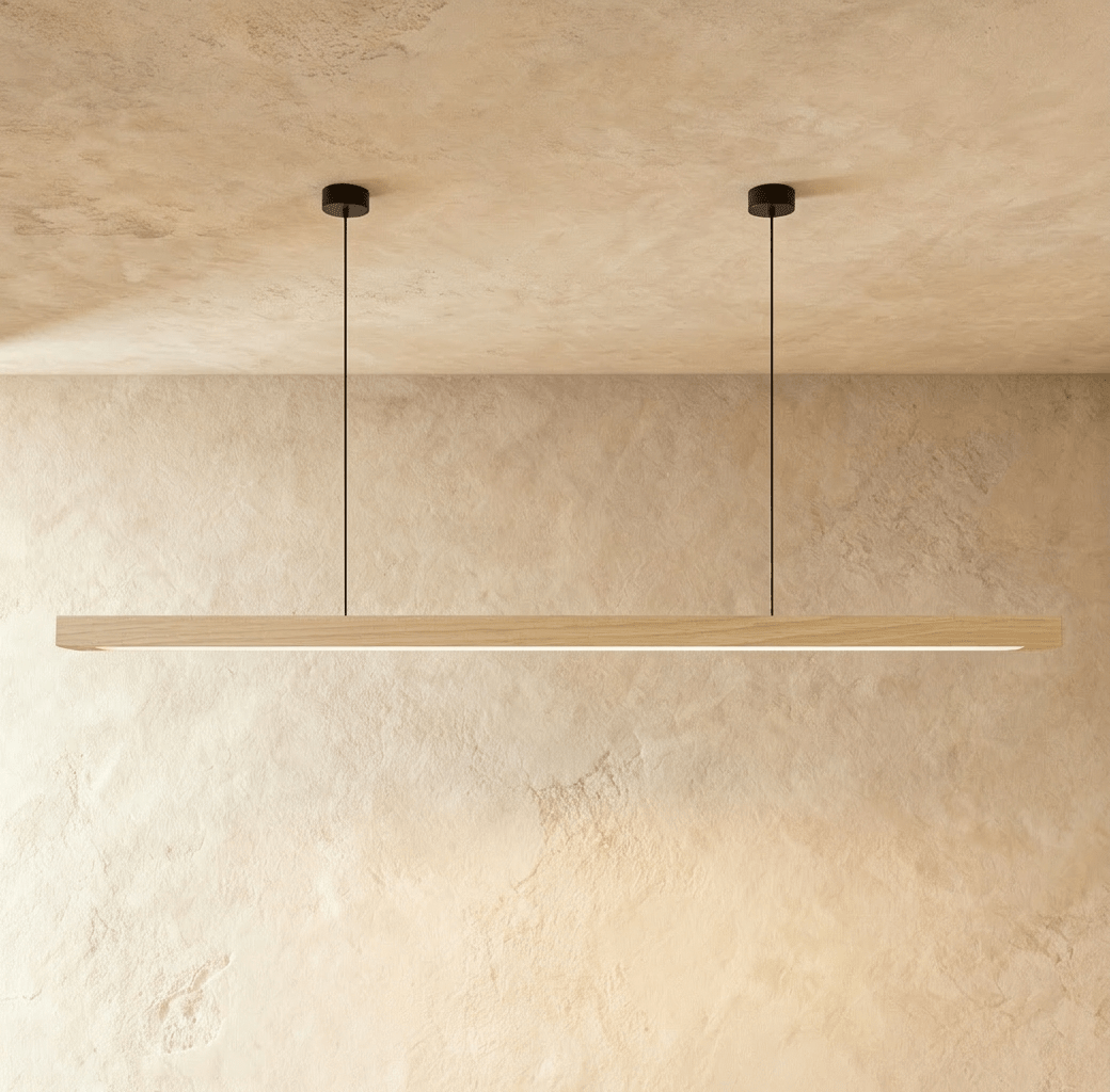 This angle shows the Clérachic pine pendant bar's warm wood grain, hung from two round black mounts.