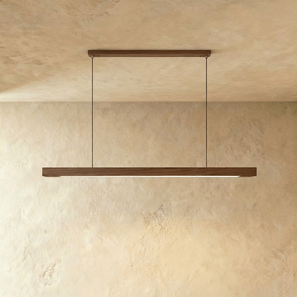 This Clérachic black walnut pendant bar hangs from its horizontal canopy, dark grain lit from below.