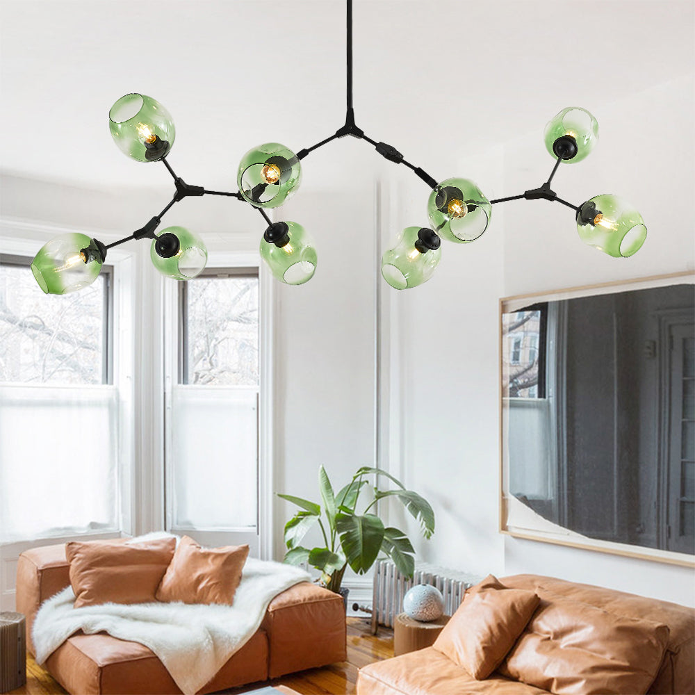 At nine heads the Clérachic chandelier reaches its full span, gradient green globes staggered in three dimensions over the room.