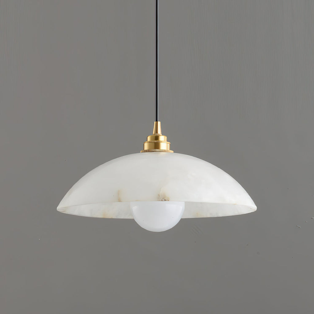 Close side view of a Clérachic alabaster pendant, showing the stepped brass lamp holder and a round opal bulb below the rim.