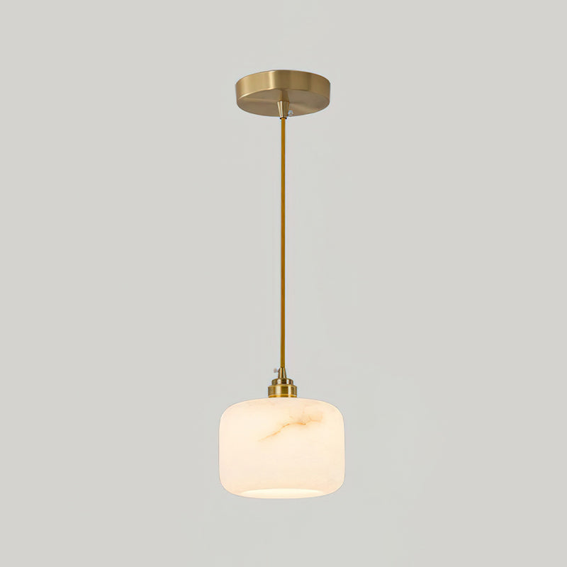 A single Clérachic alabaster pendant, brass rod and canopy, at the larger size on a plain light grey backdrop.