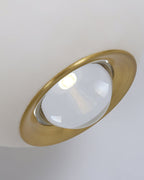 Underside of the Clérachic Brass and Alabaster Globe Cord Pendant Light, brass ring framing the clear lens over the LED.