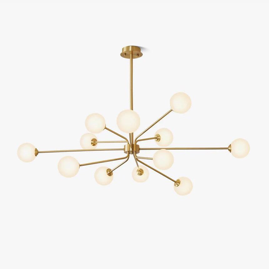 A brass Clérachic chandelier with long arms ending in frosted white globes, hanging from a short rod, on a plain white backdrop.