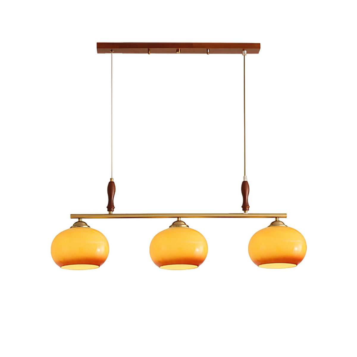 Three-head Clérachic pendant on a white backdrop, with a walnut-toned ceiling bar, brass bar, turned wooden grips and honey-amber glass shades.