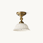 Clérachic brass and white ceramic flush-mount ceiling light, unlit, on a plain white backdrop.