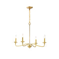 A four-arm Clérachic brass chandelier on white, its lit candle bulbs held in small dishes, hung from a chain and rod.