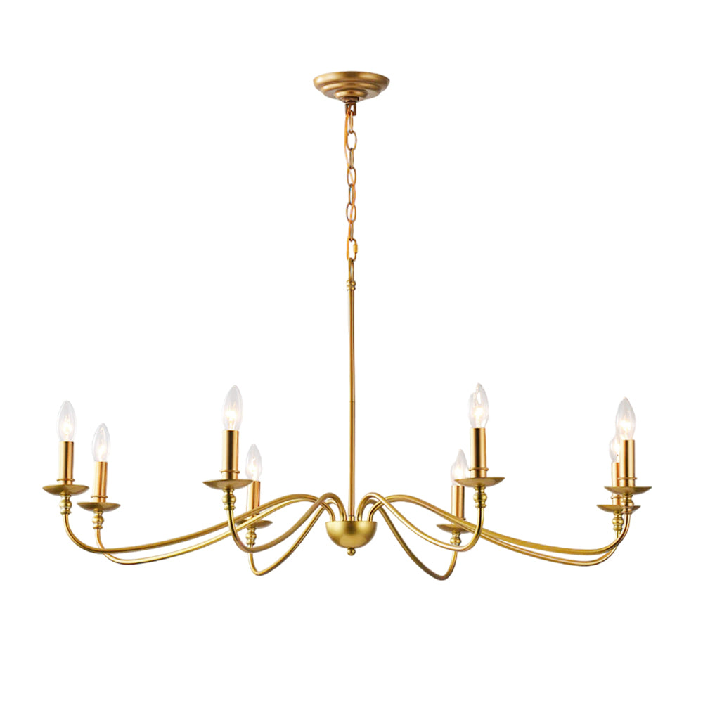 An eight-arm Clérachic brass chandelier on white, its swept arms in layers, each ending in a lit candle bulb.
