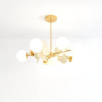 Clérachic branching chandelier of frosted glass globes and cream discs on slim brass arms and a ceiling rod.