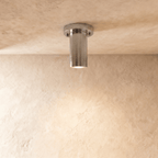Clérachic ceiling light in chrome, a slim cylinder flush-mounted against a plaster ceiling.