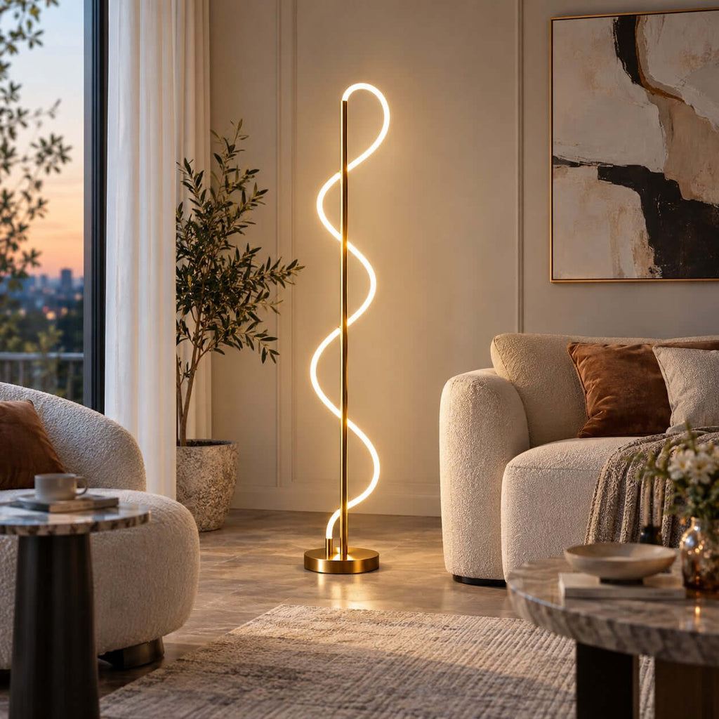 In a living room with boucle armchairs and a stone side table, the glowing silicone curve of this Clérachic floor lamp rises beside a window.