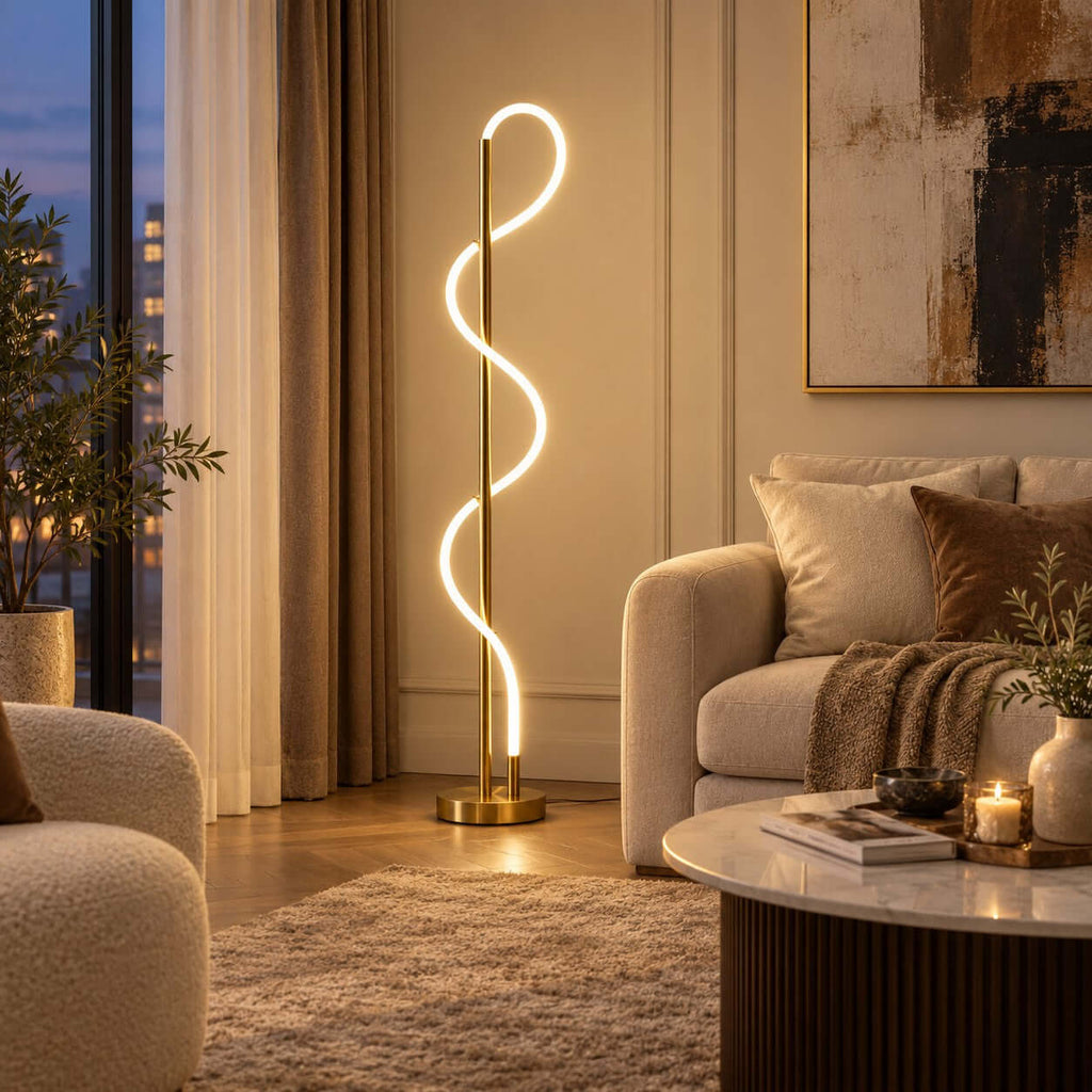 With a round wooden coffee table and a candle in front, this Clérachic floor lamp lights a cream wall under a large abstract canvas.