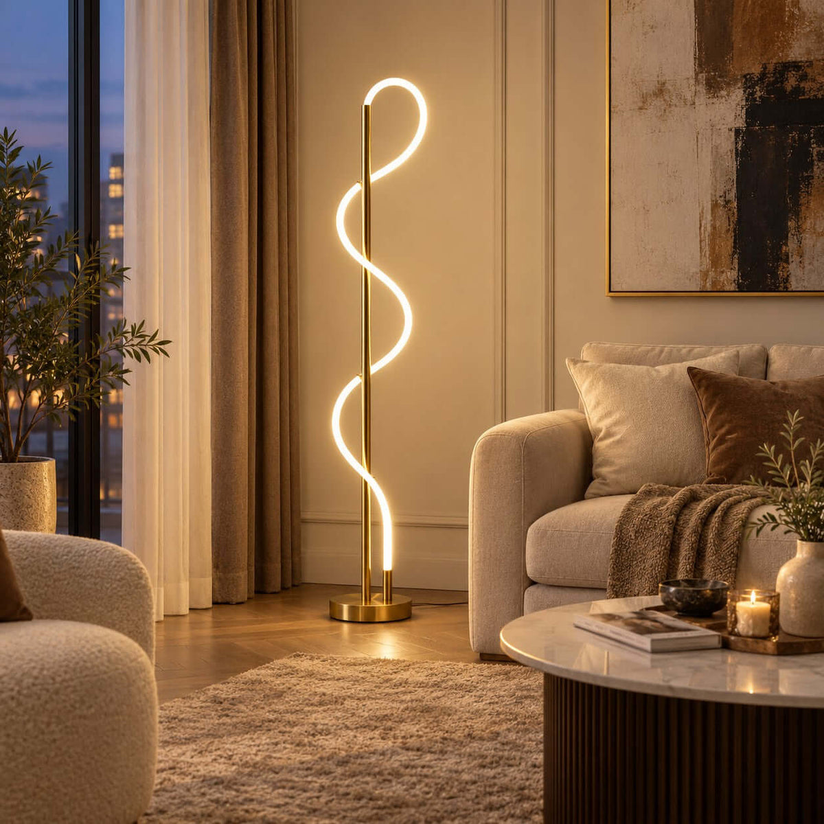 With a round wooden coffee table and a candle in front, this Clérachic floor lamp lights a cream wall under a large abstract canvas.