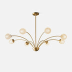 This Clérachic chandelier on a plain white backdrop, a brass central rod and curving arms ending in honeycomb-textured globes.