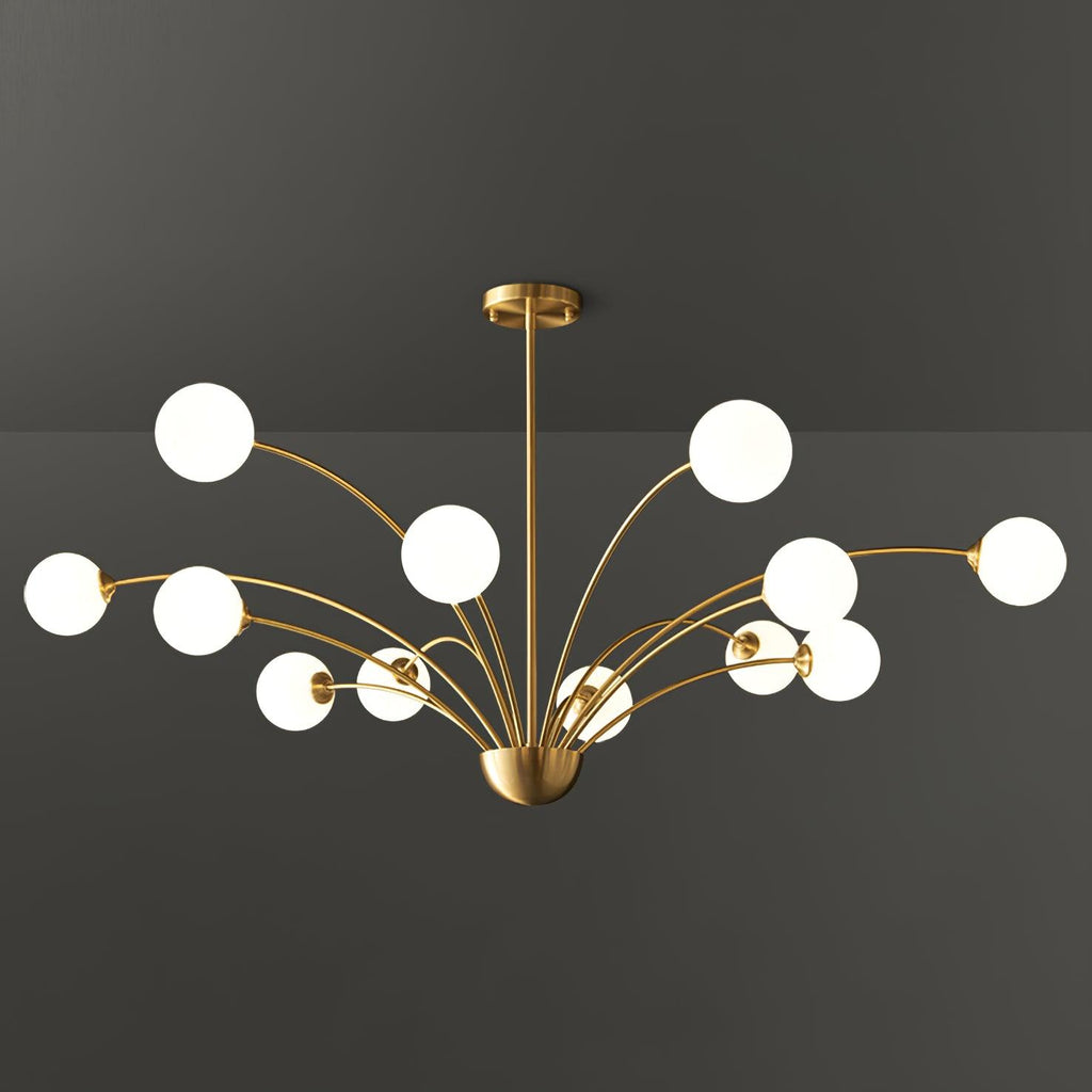 A twelve-globe Clérachic brass chandelier with white glass globes, wide and layered, against a dark grey studio backdrop.
