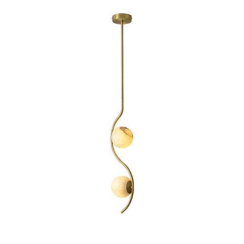 The Clérachic curved twin-head brass pendant hangs on a white backdrop, its two alabaster globes stacked along an S-curved arm.