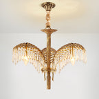 A three-leaf Clérachic chandelier hangs from a bronze ceiling plate with a twisted stem and crystal-fringed leaves.