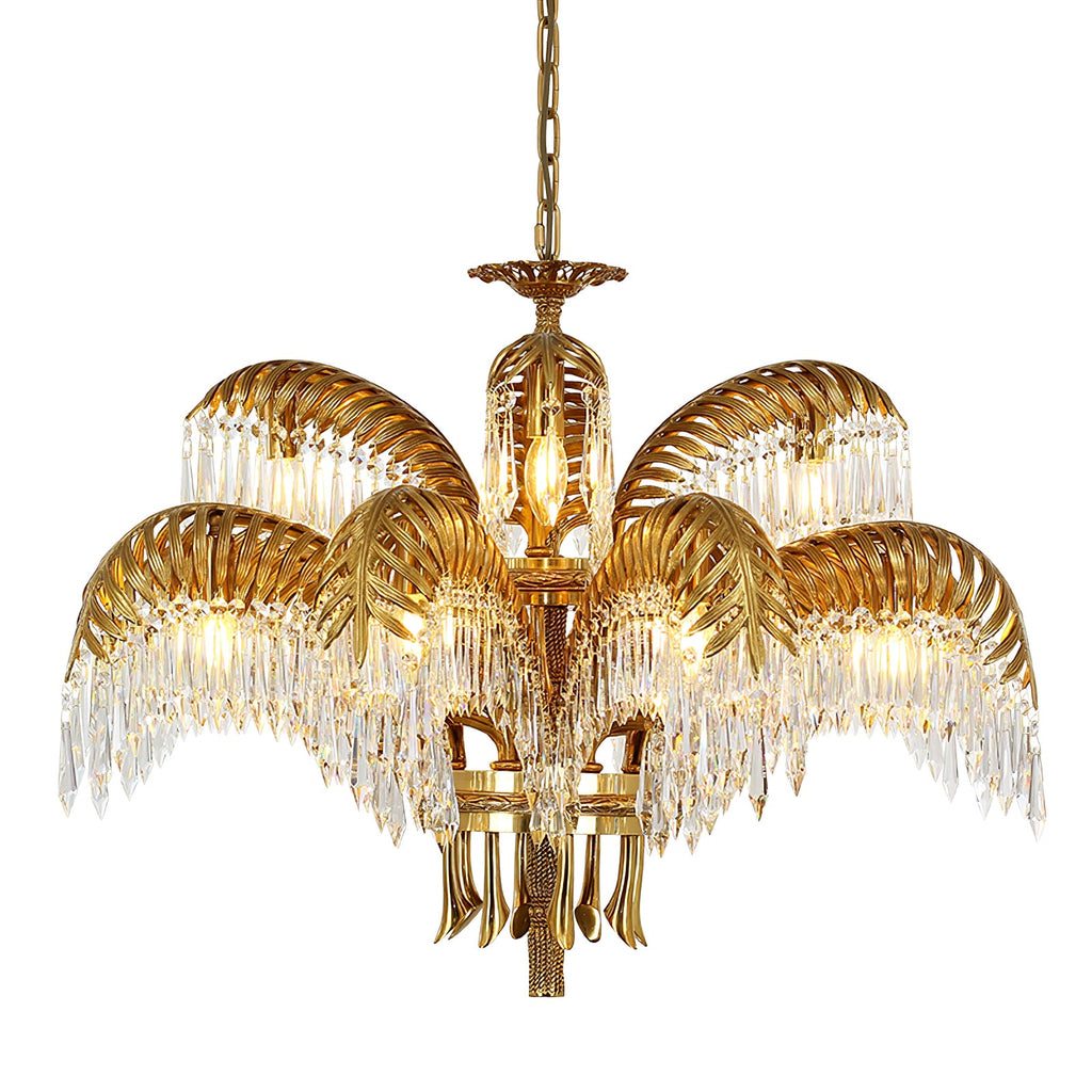 Two tiers of brass leaves with crystal fringes surround a candle-style bulb on this Clérachic chandelier.