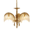 A three-leaf Clérachic chandelier with brass leaves, clear crystal drops and a brass chain, on a white background.