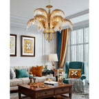 Tiered Clérachic chandelier in brass and crystal in a living room with a teal armchair, orange cushions and a coffee table.