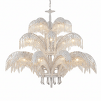 Three tiers of white leaves with crystal fringes on this large Clérachic chandelier, shown against a white backdrop.