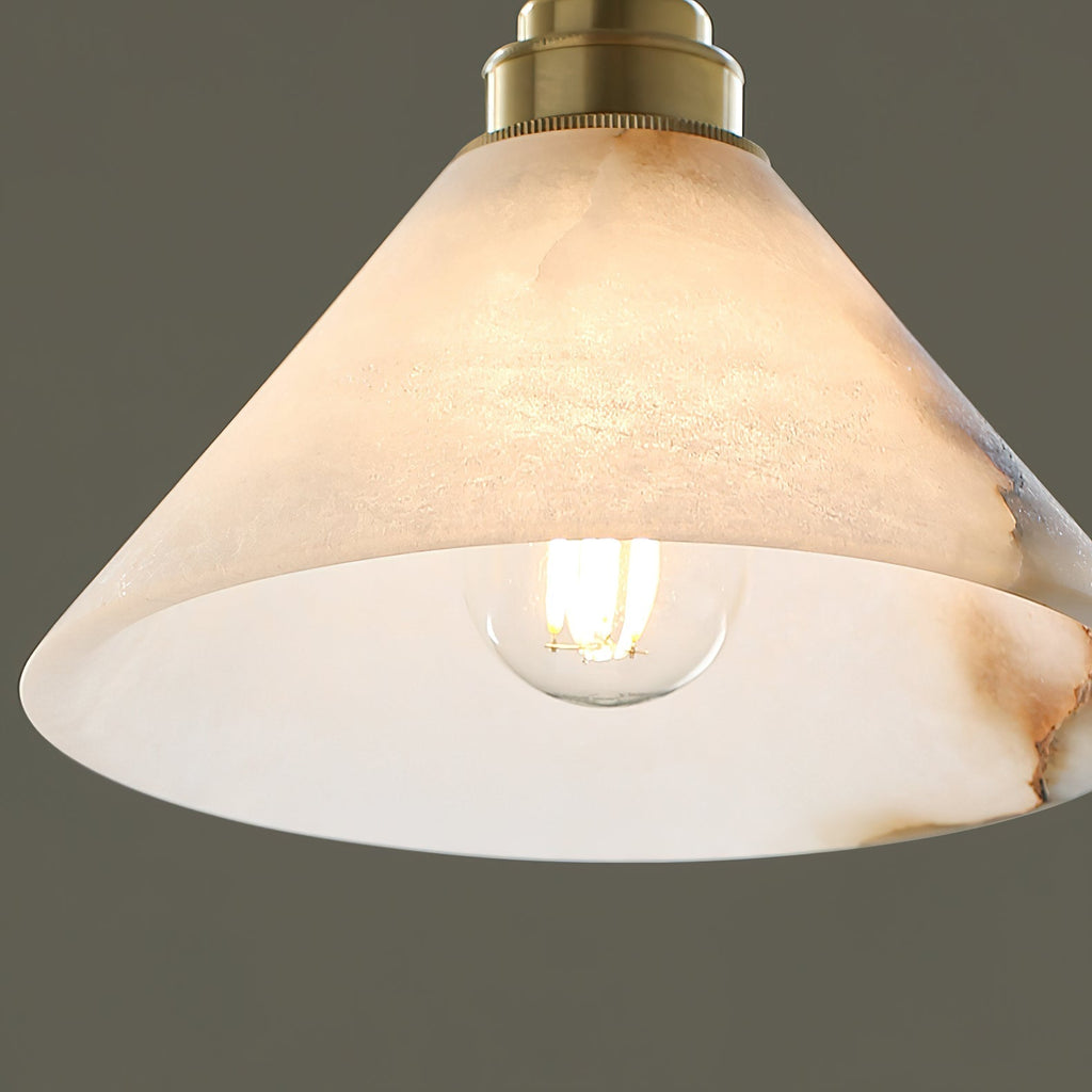 Macro detail of the Clérachic Xen pendant's alabaster shade, showing the natural grey veining unique to every piece.