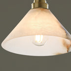 Macro detail of the Clérachic Xen pendant's alabaster shade, showing the natural grey veining unique to every piece.