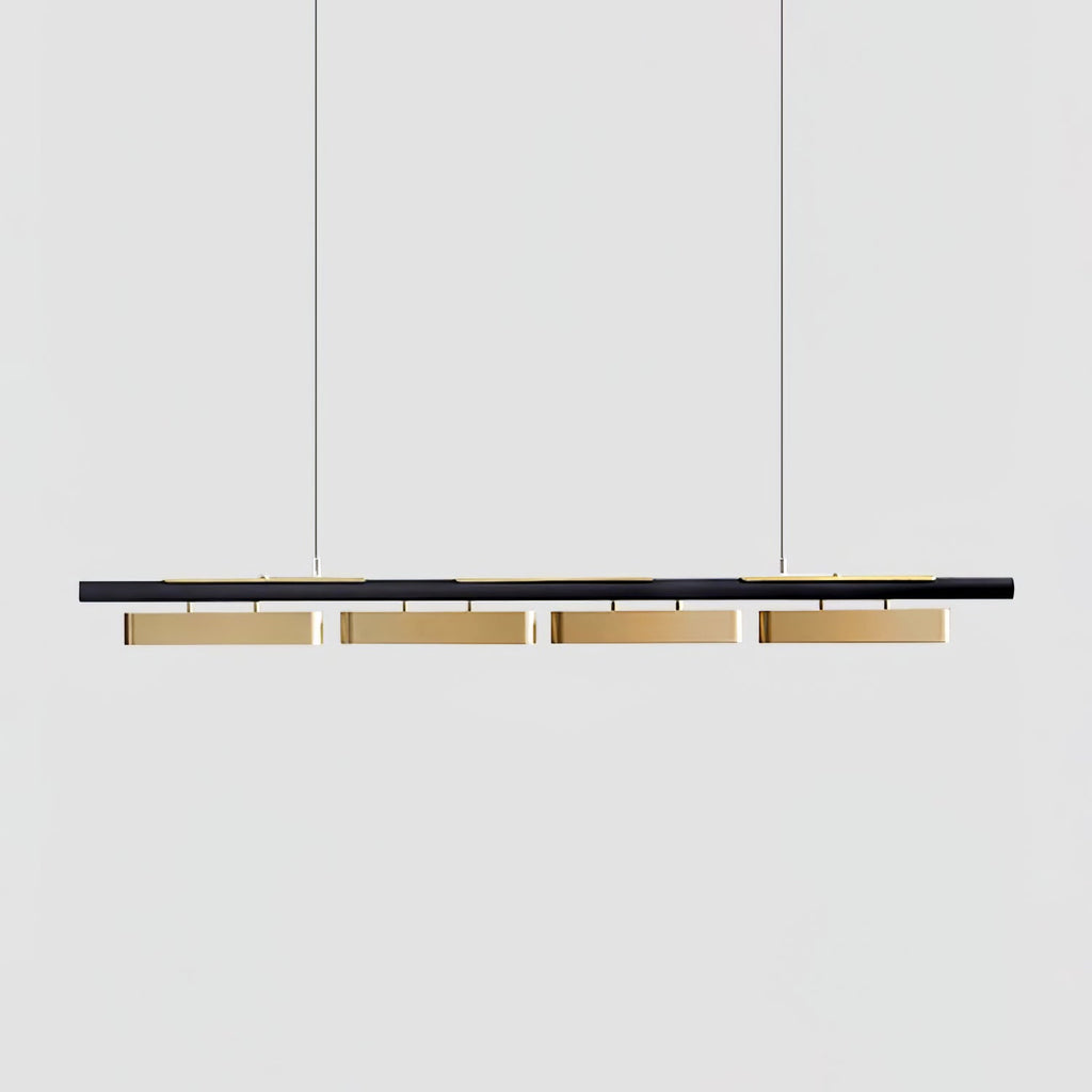 A four-head Clérachic linear pendant on a plain light grey backdrop, with brass diffusers under a slim black bar.