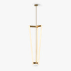 Clérachic pendant light on a plain white backdrop, three slim glowing LED tubes joined by a brass bracket and hung from a brass rod.