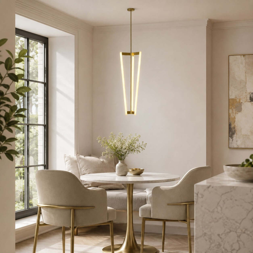 Over a small round marble table by a black-framed window, this Clérachic pendant hangs on a brass rod in a bright breakfast nook.