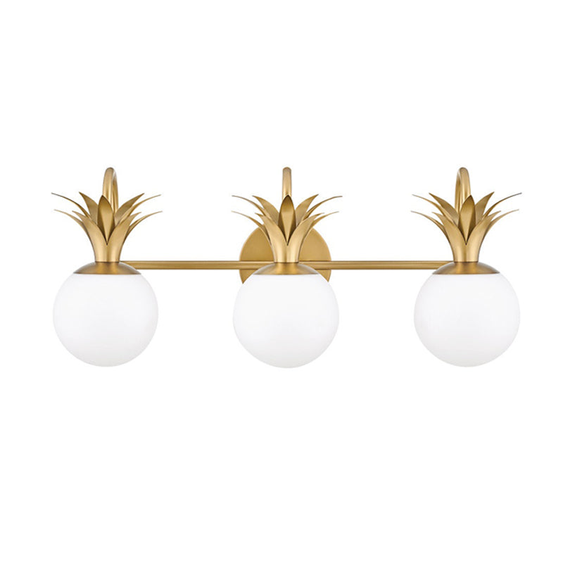 Cut-out view of the three-light version of this Clérachic wall light, with three white globes and a long brass bar.