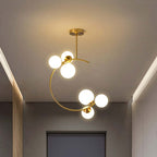 The Clérachic brass ring globe pendant in milky white glass lighting a narrow hallway beside a natural wood ceiling beam.