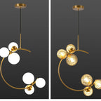 Side-by-side comparison of the Clérachic brass ring globe pendant in milky white glass (left) and clear glass (right).