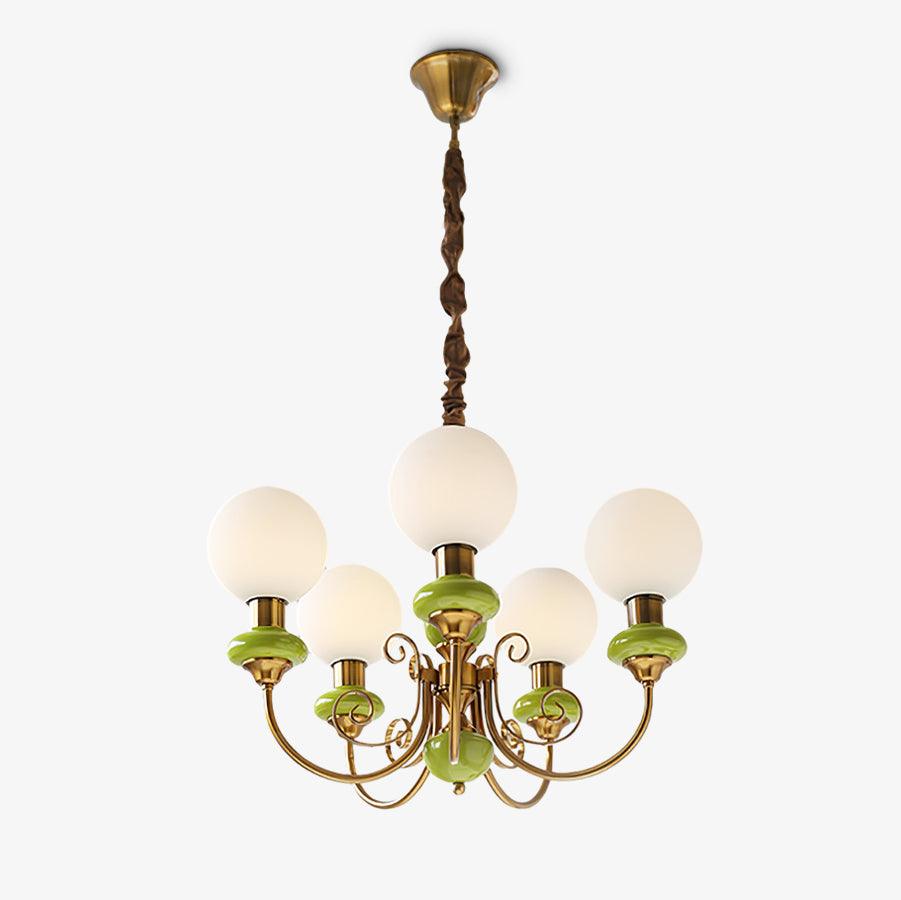 Clérachic Brass Scrollwork Chandelier in green, five lights shown unlit on a plain background with the twisted fabric flex.