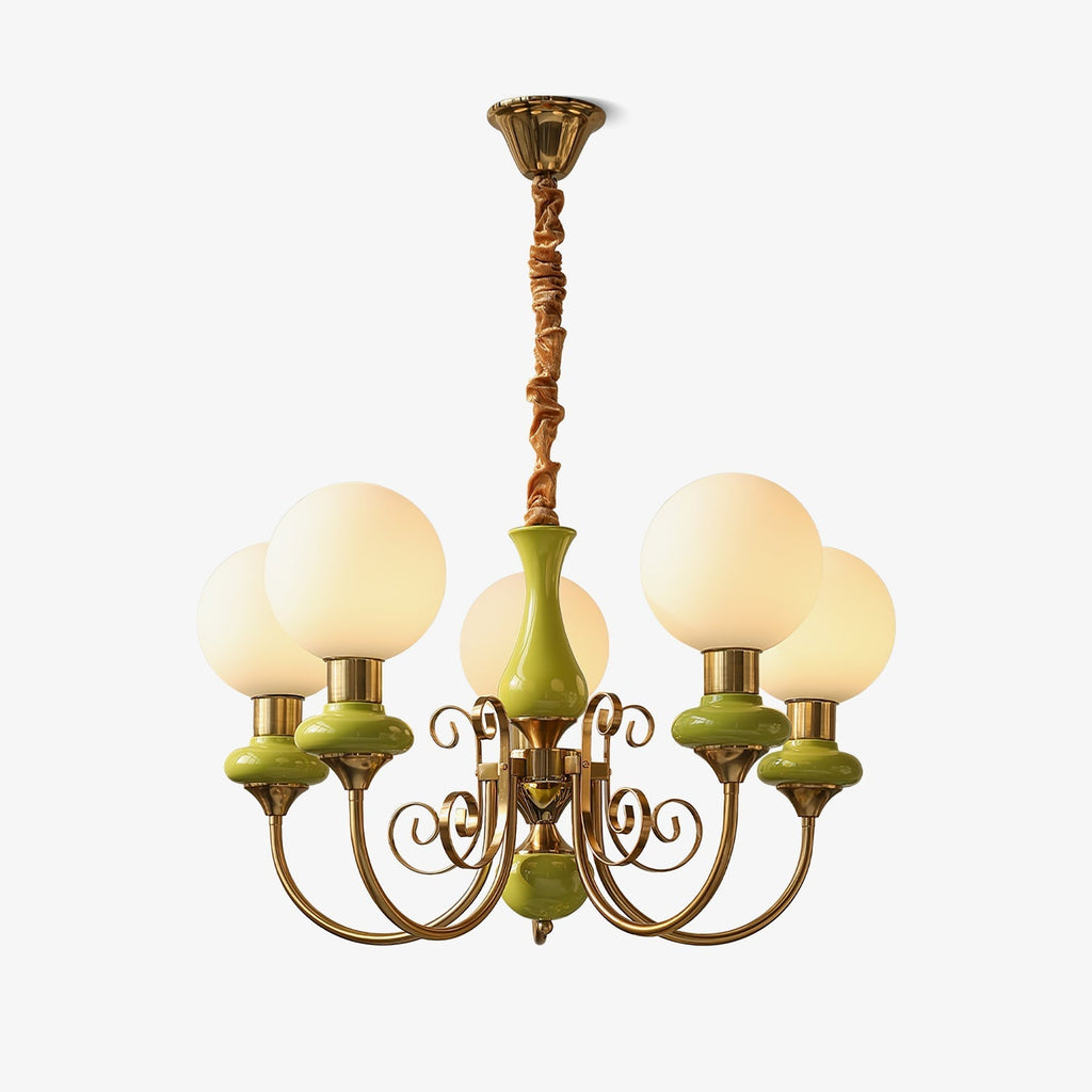 Full drop of the green Clérachic Brass Scrollwork Chandelier, brass canopy, fabric flex and five opal globes on white.