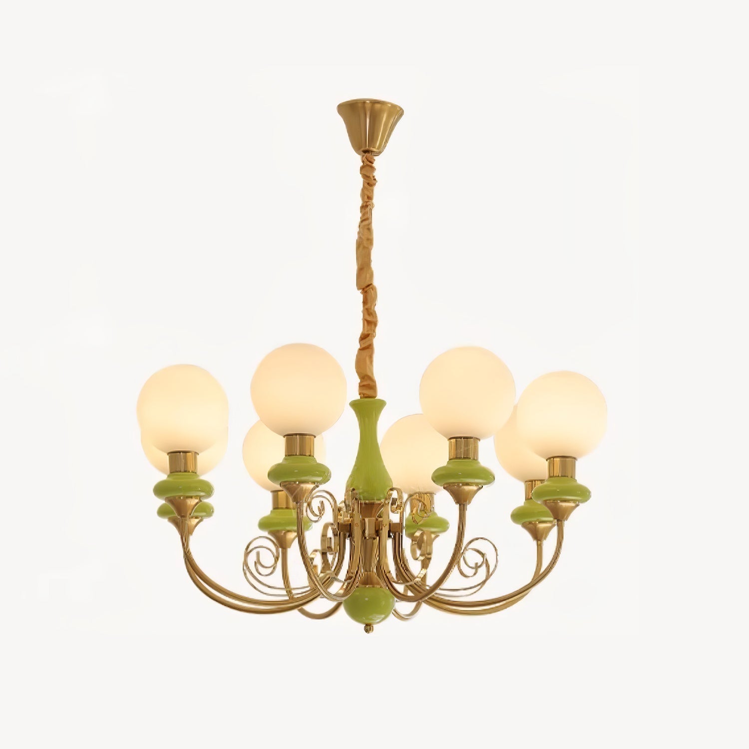 Eight-light Clérachic Brass Scrollwork Chandelier in green, arms staggered around one ring on an off-white backdrop.