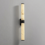 A matt black version of this Clérachic wall light, with black band, plate and end caps around veined alabaster tubes.