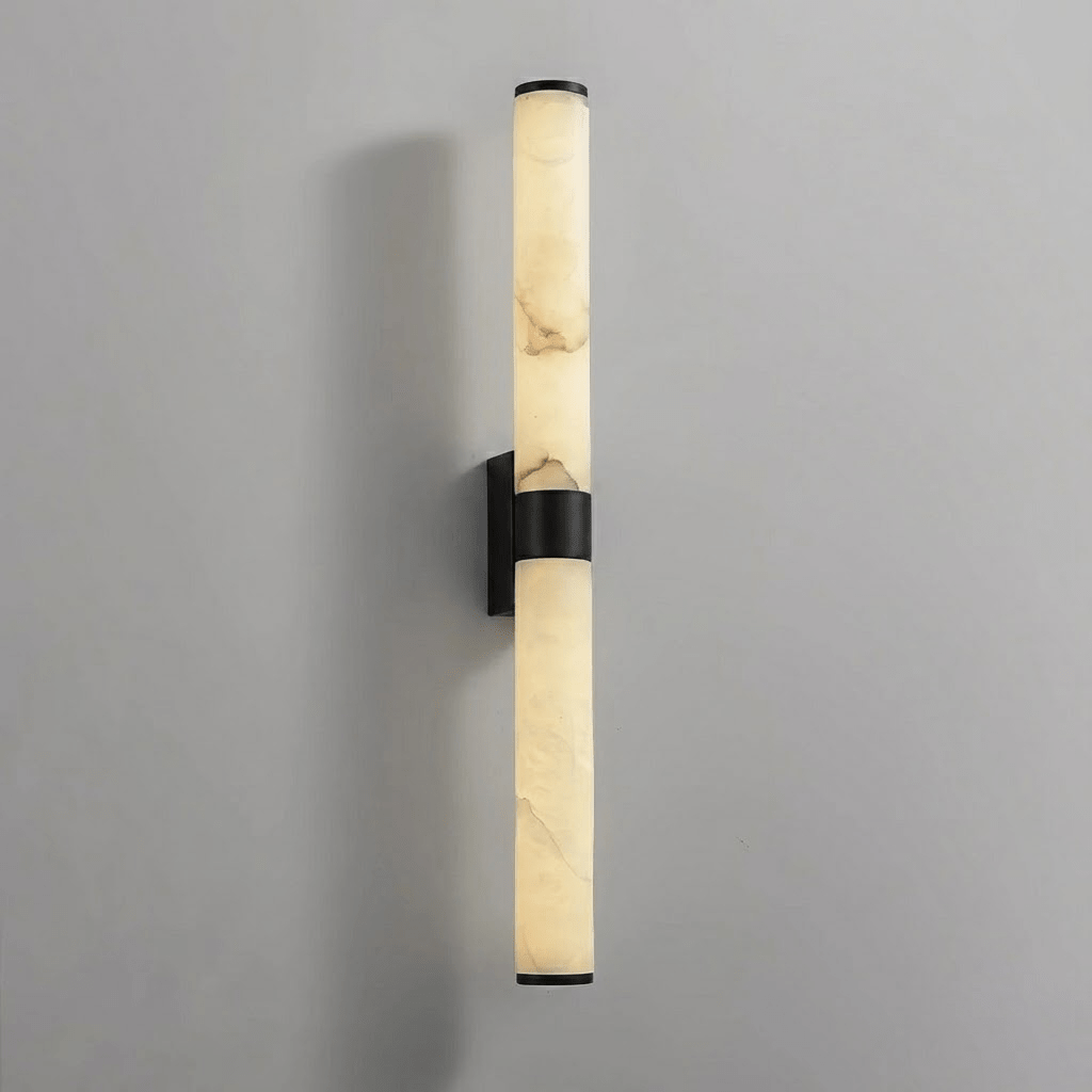 A matt black version of this Clérachic wall light, with black band, plate and end caps around veined alabaster tubes.