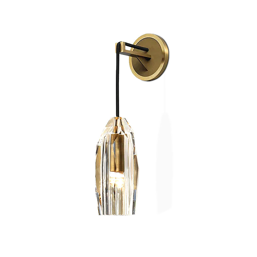 Straight-on view of this Clérachic wall light on white, showing the brass backplate, black cord arm and the hand-faceted crystal shade.