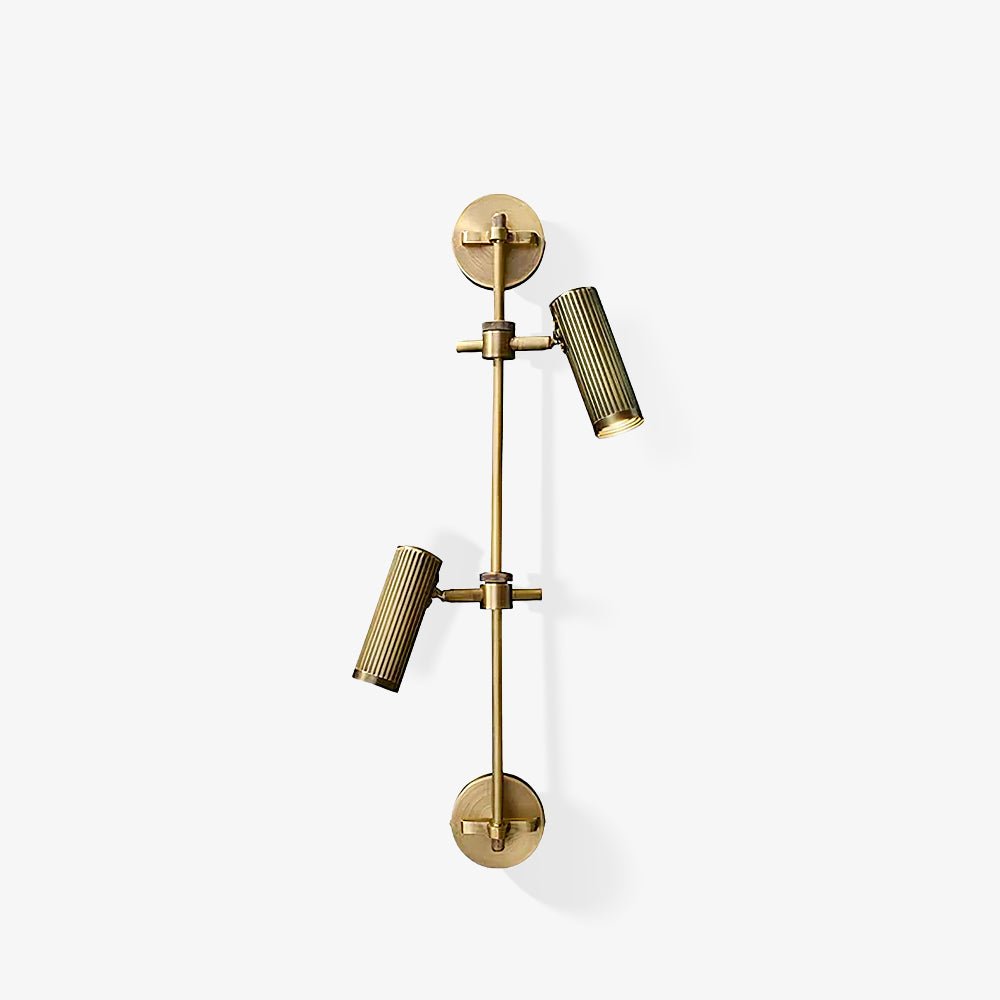Clérachic two-head bronze wall light with one head turned down and one turned out, on a light grey backdrop.